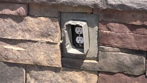 electrical box on unlevel rock|installing electrical box on stone.